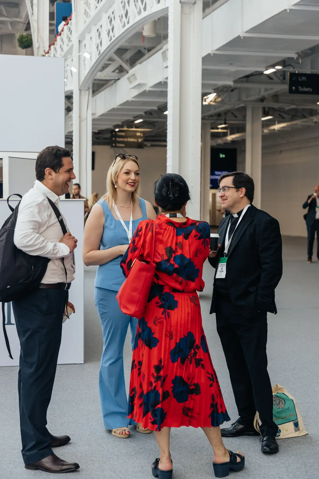 Four delegates talking at ARC 2026