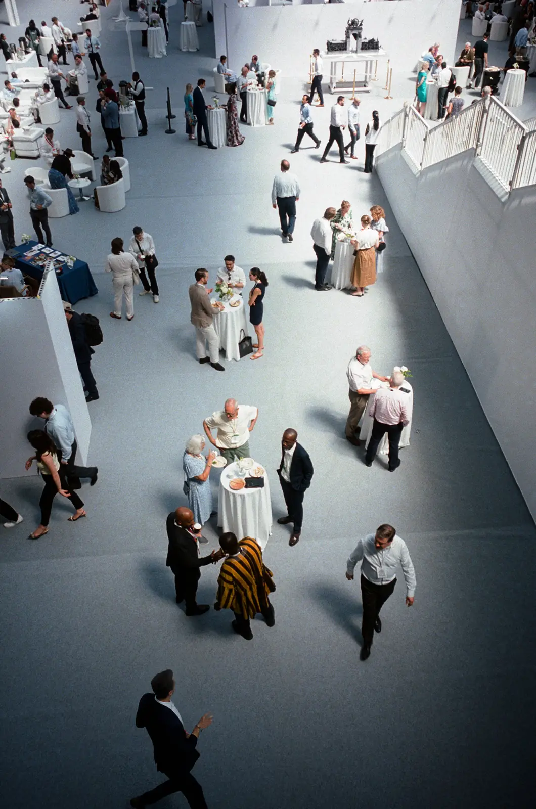 Delegates gathered in the lobby, seen from above