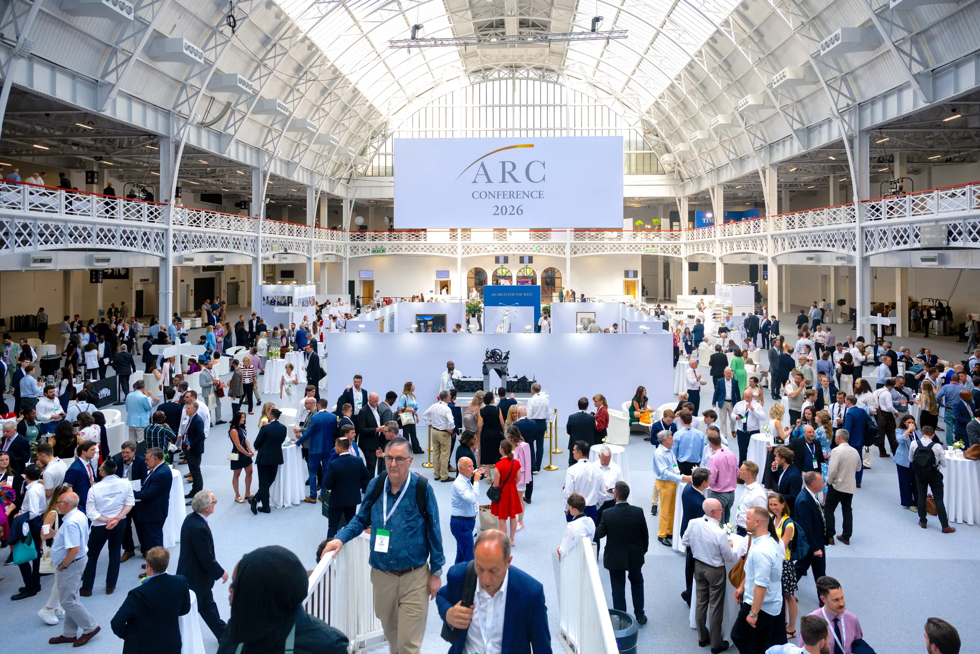 Delegates gathered beneath the ARC Conference banner in the Olympia hall